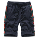 Loose casual sport pants in navy with striped side detailing for men, perfect for sports or casual outings.
