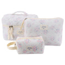 Juoxeepy floral cotton makeup bag set in soft pastels, including medium cosmetic bag and pen pouch, perfect for organizing toiletries.