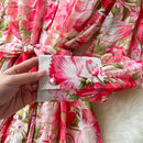 boho floral summer dress close-up of floral print fabric and buttons