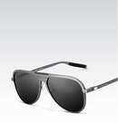 Polarized sunglasses for men with sleek gray frames and black lenses, offering style and UV protection