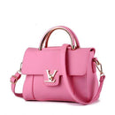 Versatile shoulder crossbody tote bag in pink PU leather, chic design with gold accents and dual carrying options.