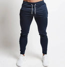Men in slim fit casual pants for men, showcasing a stylish and comfortable design for autumn and winter.