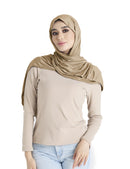 Premium jersey hijab for women in camel color worn elegantly with casual outfit, showcasing soft drape and stylish look.