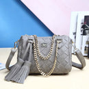 Stylish Handbag, Shoulder Bag, Crossbody Bag with a woven design and tassel details in grey.