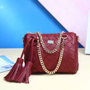 Elegant red Handbag, Shoulder Bag, Crossbody Bag with stylish chain and tassel details.