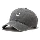 Smile face baseball cap in grey, vintage distressed style, adjustable cotton dad hat for men and women.
