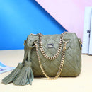 Handbag, Shoulder Bag, Crossbody Bag in stylish olive green with chain strap and tassel details on a vibrant background.