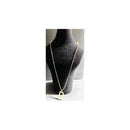 Elegant women's pendant necklace displayed on a black jewelry stand, showcasing its 16" length and unique design.