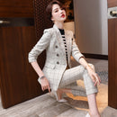 Plaid Formal Suit for Women's Office Attire modeled by a woman in a stylish office setting.