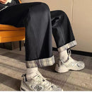 High-Waist Denim Cargo Pants with Nine Points, featuring a trendy plaid cuff and casual white sneakers.