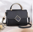 Oblique crossbody bag for women with gold accents and adjustable strap for stylish everyday use.