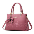 Stylish Women's Handbag, Shoulder Bag, Crossbody Bag in pink with floral design and bow, perfect for any occasion.