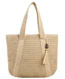 Fashion straw shoulder bag with chic mahogany pendant, perfect for beachwear and casual outings.