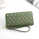 Women's large capacity zipper wallet in green with colorful heart designs and wrist strap.