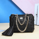 Stylish Handbag, Shoulder Bag, Crossbody Bag with woven texture and tassel detail.
