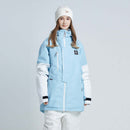 Loose Fleece-lined Hoodie for Women's Fashion worn by a model in a blue and white ensemble with a beanie.