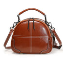 Stylish messenger bag made from high-quality PU fabric, featuring a horizontal square shape and a chic brown finish.