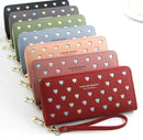 Colorful women's large capacity zipper wallet collection with heart embellishments.
