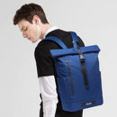 Nylon Men's Business Backpack in blue on a model, showcasing style and functionality for work and school.