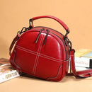 Stylish messenger bag in red PU fabric with a unique horizontal square shape, perfect for every modern woman.