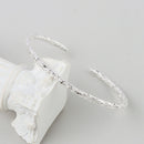 Women's Fashion Simple Irregular Bracelet in shiny silver, designed for elegance and style.