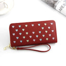 Women's large capacity zipper wallet in red with heart patterns, perfect for modern fashion.