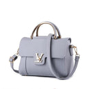 Versatile shoulder crossbody tote bag in grey PU leather with gold accents and a chic design.
