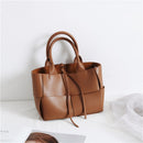 Vintage Women's Woven Crossbody Handbag in brown leather, featuring elegant design and durable craftsmanship.