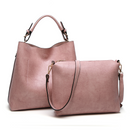 Women's tote crossbody bag set in pink, featuring a stylish handbag and a complementing crossbody purse.