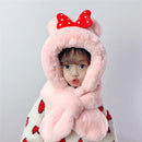 Thick children's scarves and hats featuring a pink plush design with a bow and cute ears for warmth and style.