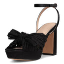 Womens heeled platform sandals in black with knot detail and ankle strap, perfect for casual and formal occasions.