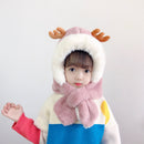 Thick children's scarves and hats featuring a cute reindeer design worn by a girl.