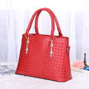 Versatile crossbody handbag in red with elegant design, suitable for handheld, shoulder, or crossbody wear.