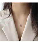 Minimalist Silver Pendant Necklace with Circle Charm front view