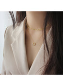 Minimalist Silver Pendant Necklace with Circle Charm front view