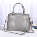 Versatile crossbody handbag with stylish design, featuring dual handles and adjustable strap, perfect for any occasion.