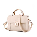 Versatile shoulder crossbody tote bag in stylish beige PU leather with a handle and adjustable strap.