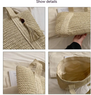 Fashion straw shoulder bag with tassel detail, showcasing a lightweight straw design and spacious interior.