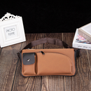 Versatile waist bag in brown PU leather with zipper buckle and pockets for secure storage and stylish outdoor use.